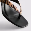 Mules mit Fersenriemen und Tiermuster