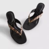 Mules mit Fersenriemen und Tiermuster