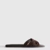Mules mit geflochtenen Riemen Mules mit geflochtenen Riemen