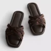 Mules mit geflochtenen Riemen Mules mit geflochtenen Riemen