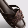 Mules mit geflochtenen Riemen Mules mit geflochtenen Riemen