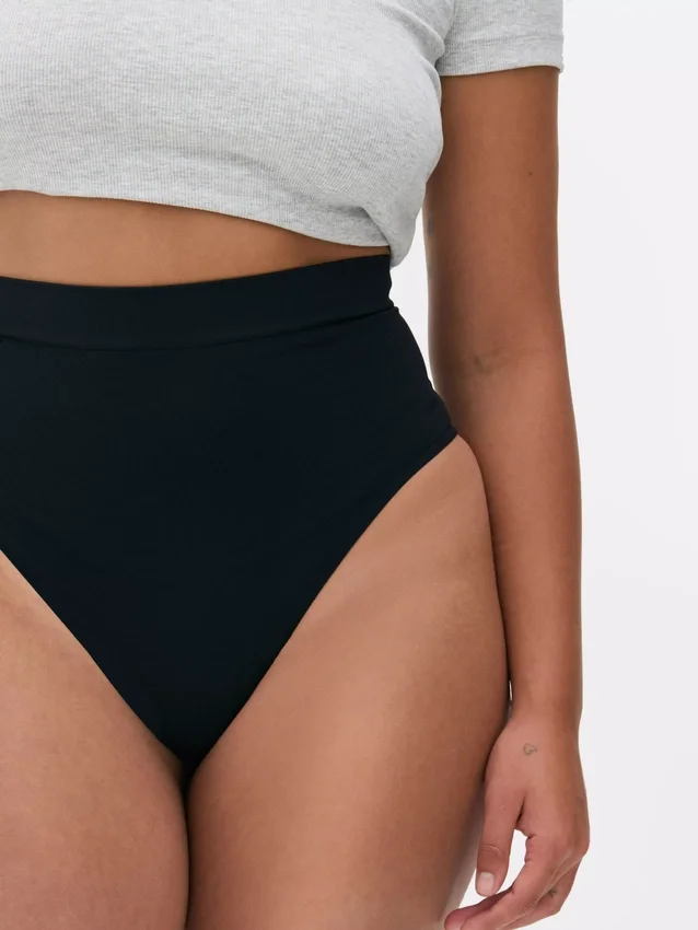 Nahtloser, figurformender String mit hoher Taille Nahtloser, figurformender String mit hoher Taille
