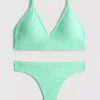 Nahtloses, gepolstertes Set aus Triangel-BH und String Nahtloses, gepolstertes Set aus Triangel-BH und String