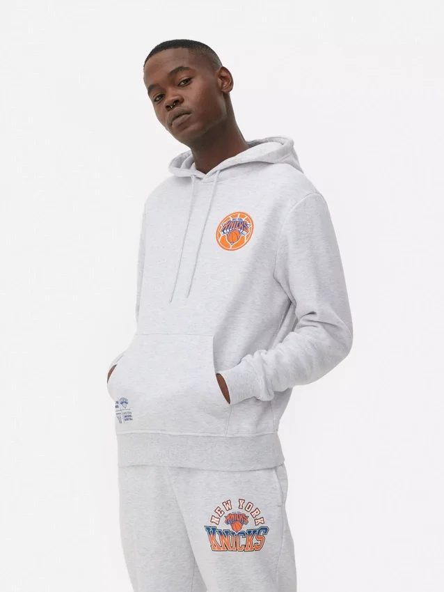 NBA New York Knicks Kapuzenpullover mit Kordelzug NBA New York Knicks Kapuzenpullover mit Kordelzug