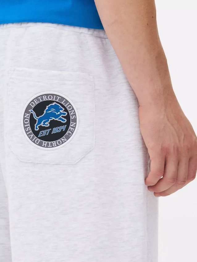 NFL Detroit Lions Jogginghosen mit Kordelzug NFL Detroit Lions Jogginghosen mit Kordelzug