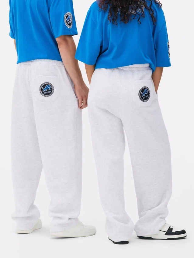 NFL Detroit Lions Jogginghosen mit Kordelzug NFL Detroit Lions Jogginghosen mit Kordelzug