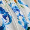 Orangefarbene Badeshorts mit strukturierter Oberfläche Orangefarbene Badeshorts mit strukturierter Oberfläche