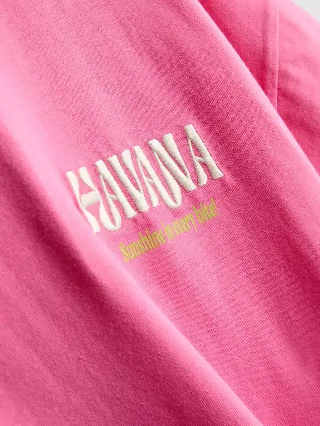 Oversize-T-Shirt mit Grafikprint aus baumwollreicher Havanna-Baumwolle Oversize-T-Shirt mit Grafikprint aus baumwollreicher Havanna-Baumwolle