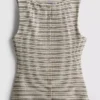 Paula Echevarría – Gestricktes, gestreiftes Oberteil mit Knopfleiste Paula Echevarría – Gestricktes, gestreiftes Oberteil mit Knopfleiste