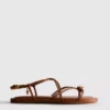 Paula Echevarría Riemchen-Sandalen mit Anhänger