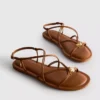 Paula Echevarría Riemchen-Sandalen mit Anhänger