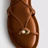 Paula Echevarría Riemchen-Sandalen mit Anhänger
