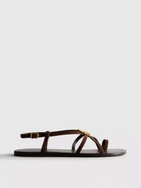 Paula Echevarría Riemchensandalen mit Seestern-Motiv