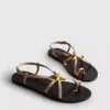 Paula Echevarría Riemchensandalen mit Seestern-Motiv