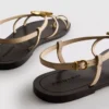 Paula Echevarría Riemchensandalen mit Seestern-Motiv