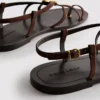 Paula Echevarría Riemchensandalen mit Seestern-Motiv