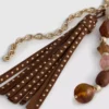 Paula Echevarría Taschenanhänger mit Perlen und Quaste