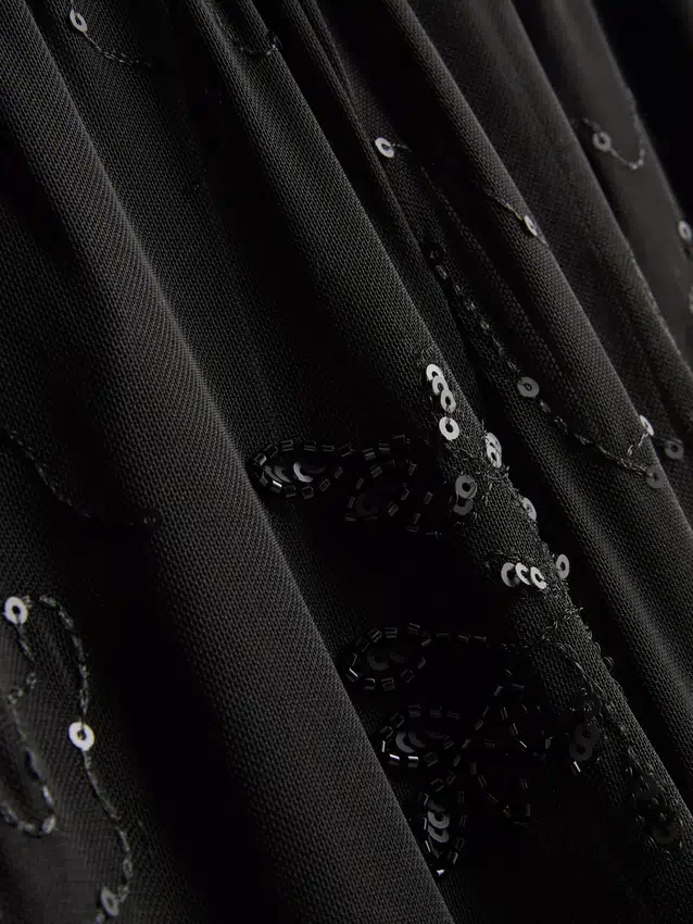Paula Echevarría – Weite Hose aus Netzstoff mit Perlenverzierung Paula Echevarría – Weite Hose aus Netzstoff mit Perlenverzierung