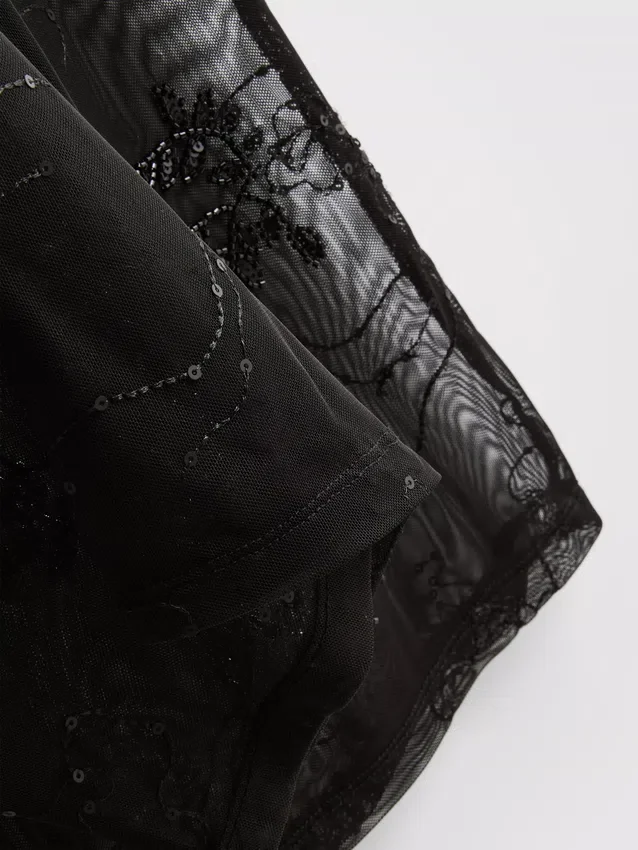 Paula Echevarría – Weite Hose aus Netzstoff mit Perlenverzierung Paula Echevarría – Weite Hose aus Netzstoff mit Perlenverzierung