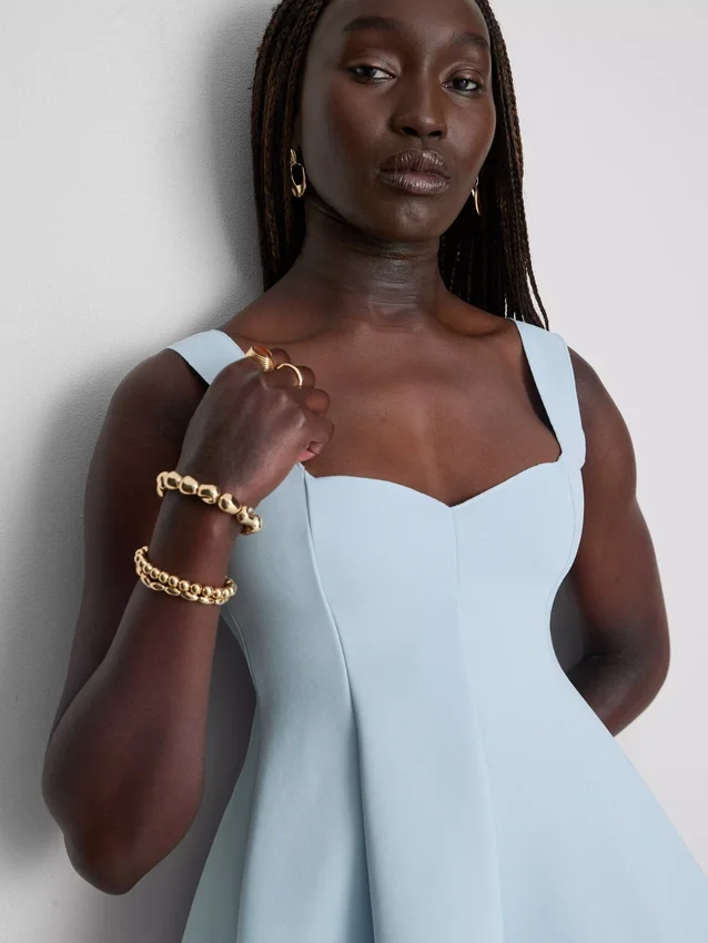 Peplum-Oberteil aus Krepp mit Herzausschnitt Peplum-Oberteil aus Krepp mit Herzausschnitt