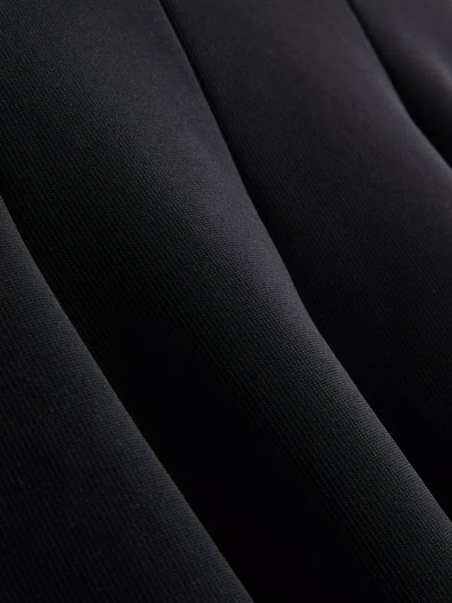 Peplum-Oberteil aus Krepp mit Herzausschnitt Peplum-Oberteil aus Krepp mit Herzausschnitt