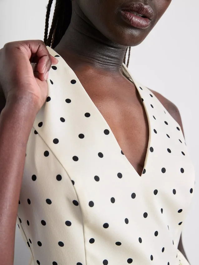 Peplum-Top mit Neckholder und Polka-Dots Peplum-Top mit Neckholder und Polka-Dots