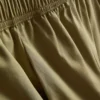 Plissierte Hose mit weitem Bein in Papieroptik