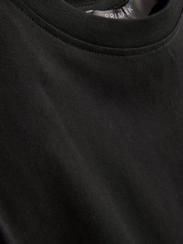 Ärmelloses T-Shirt mit Schulterpolstern Ärmelloses T-Shirt mit Schulterpolstern