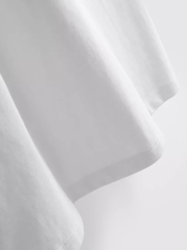 Ärmelloses T-Shirt mit Schulterpolstern Ärmelloses T-Shirt mit Schulterpolstern