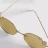 Runde Sonnenbrille mit Blumenmotiv Runde Sonnenbrille mit Blumenmotiv