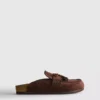 Sandalen im Clog-Stil aus Kunstwildleder mit Quasten