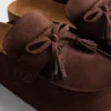 Sandalen im Clog-Stil aus Kunstwildleder mit Quasten
