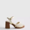 Sandalen mit Nietenbesatz aus Kunstwildleder und High Heels