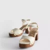 Sandalen mit Nietenbesatz aus Kunstwildleder und High Heels