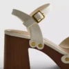 Sandalen mit Nietenbesatz aus Kunstwildleder und High Heels