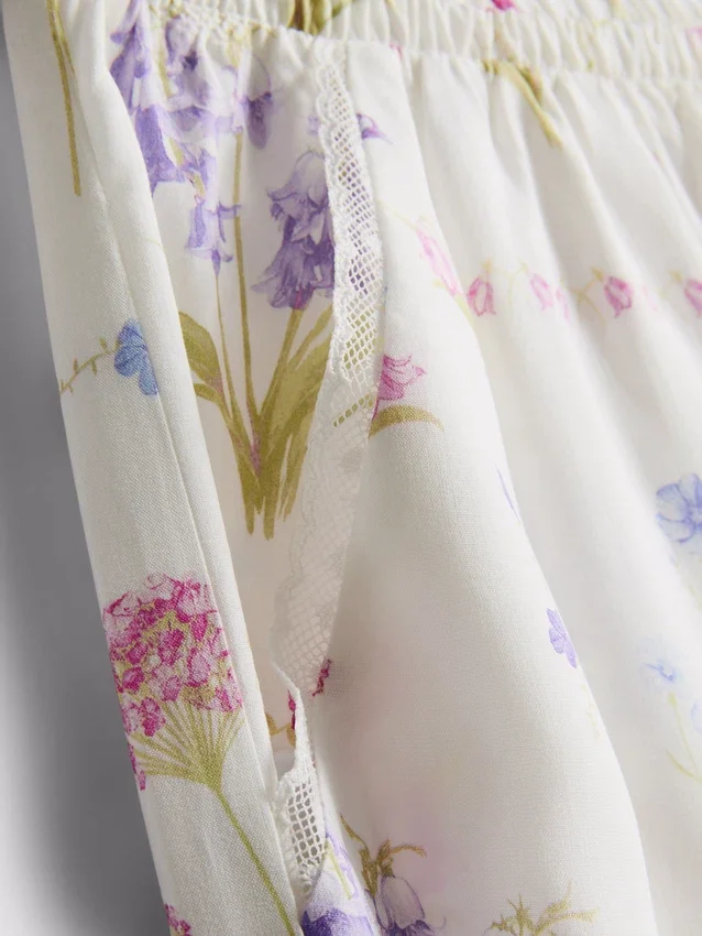 Schlafhose mit weitem Bein und Blumenmuster Schlafhose mit weitem Bein und Blumenmuster
