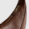 Schultertasche aus Kunstwildleder in Mondform