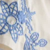 Shorts aus Baumwolle mit Blumenstickerei Shorts aus Baumwolle mit Blumenstickerei