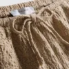 Shorts mit Kordelzug und Crinkle-Optik Shorts mit Kordelzug und Crinkle-Optik