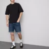 Slim-Fit-Jeansshorts mit mittlerer Leibhöhe Slim-Fit-Jeansshorts mit mittlerer Leibhöhe