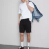 Slim-Fit-Jeansshorts mit mittlerer Leibhöhe Slim-Fit-Jeansshorts mit mittlerer Leibhöhe