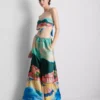 Strandhose aus Satin mit landschaftlichem Print Strandhose aus Satin mit landschaftlichem Print