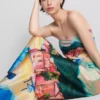 Strandhose aus Satin mit landschaftlichem Print Strandhose aus Satin mit landschaftlichem Print