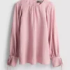 Strukturierte Bluse mit Ballonärmeln Strukturierte Bluse mit Ballonärmeln