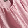 Strukturierte Bluse mit Ballonärmeln Strukturierte Bluse mit Ballonärmeln