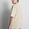 Strukturiertes, kastenförmiges T-Shirt Strukturiertes, kastenförmiges T-Shirt