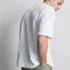 Strukturiertes, kastenförmiges T-Shirt Strukturiertes, kastenförmiges T-Shirt
