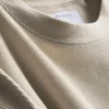 Strukturiertes, kastenförmiges T-Shirt Strukturiertes, kastenförmiges T-Shirt