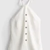 Strukturiertes Neckholder-Top mit Knopfleiste Strukturiertes Neckholder-Top mit Knopfleiste