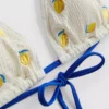 Strukturiertes Triangel-Bikini-Oberteil mit Zitronenmotiv Strukturiertes Triangel-Bikini-Oberteil mit Zitronenmotiv